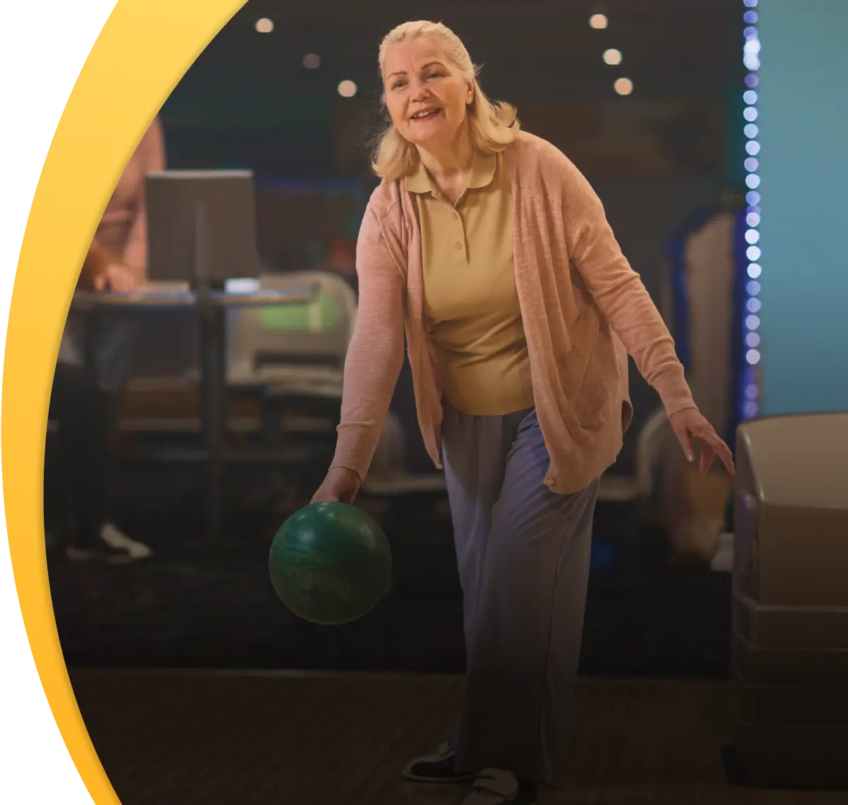 Portrait of Andrea smiling during her bowling game.